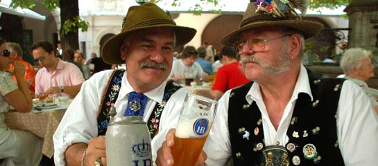 The Hofbrauhaus is known for its traditional German beer, served in large beer steins.  // © 2011 Hofbrauhaus F
